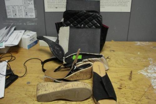 Shoes and pocketbook in which cocaine was hidden